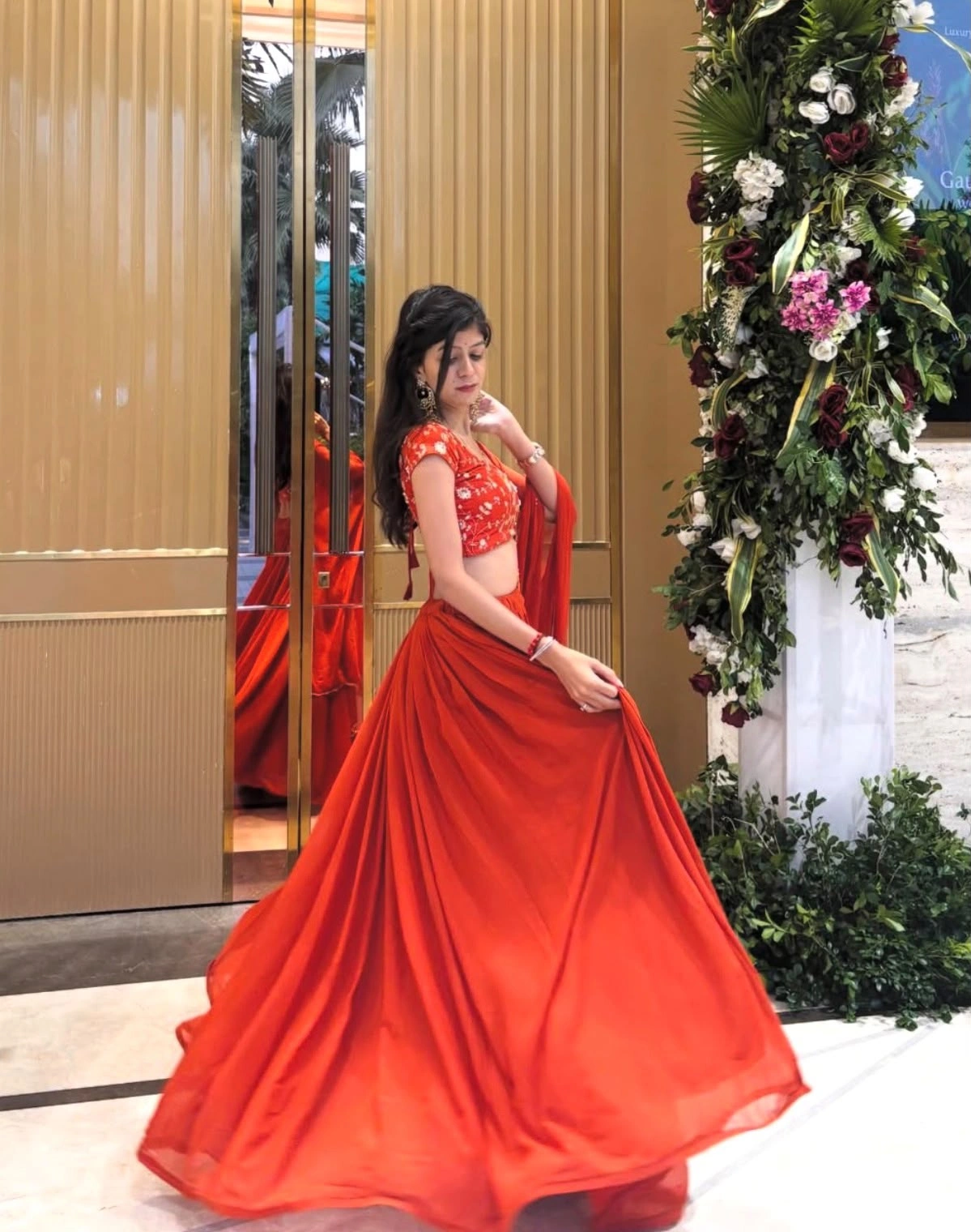 Customer wearing a custom outfit by Outfits by Deepshikhaa